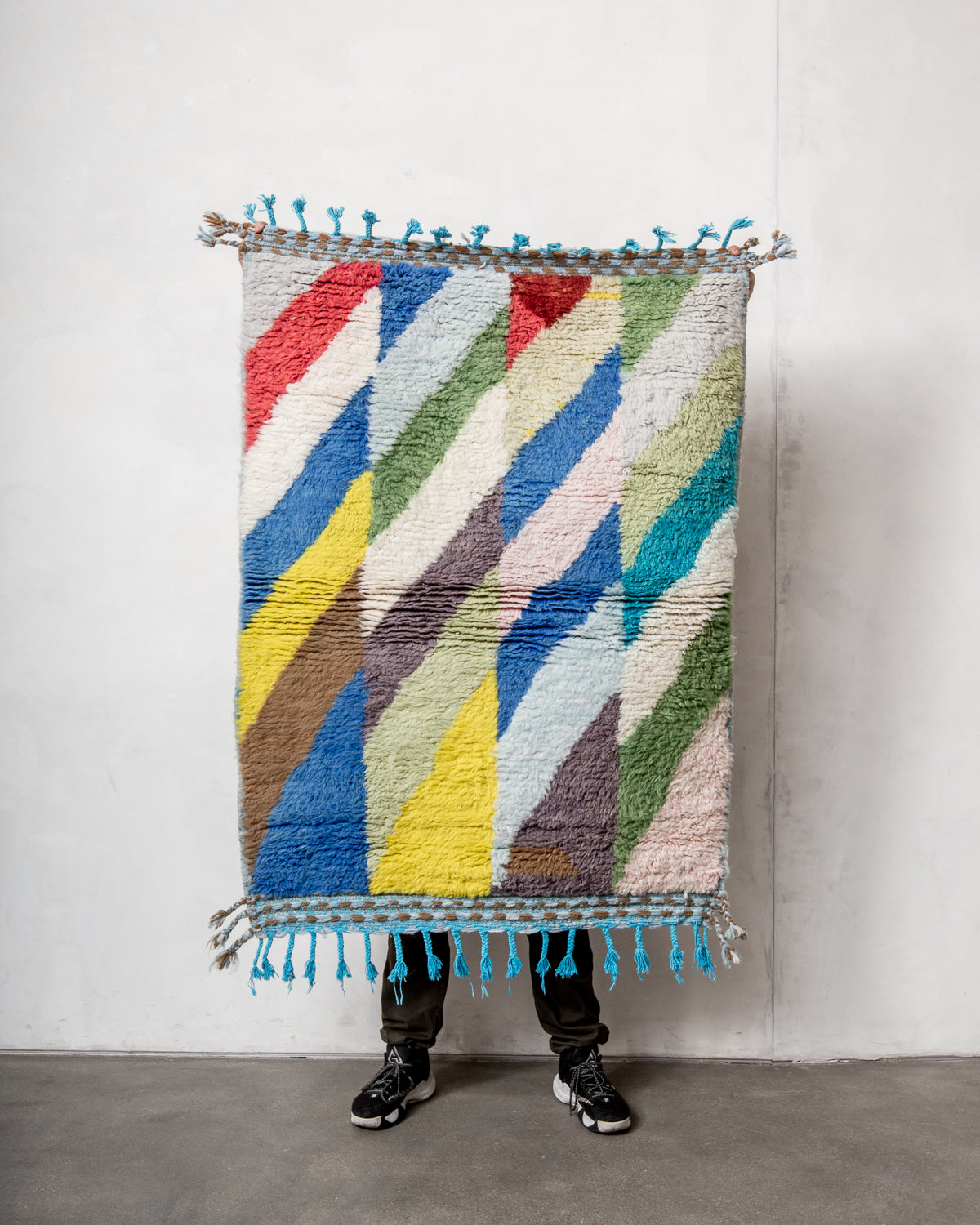 Modern, designer, handcrafted Berber rug from Morocco. Beniourain carpet with beautiful colours and patterns and fluffy wool texture.